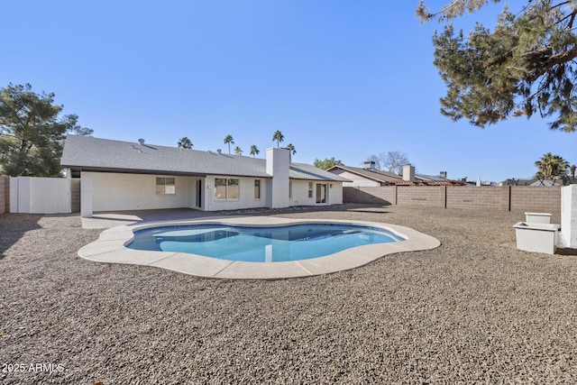 view of pool featuring a patio area