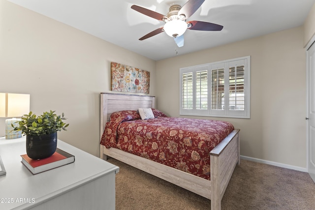 bedroom with carpet and a ceiling fan