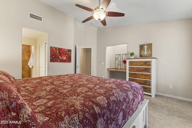 carpeted bedroom with ceiling fan and baseboards