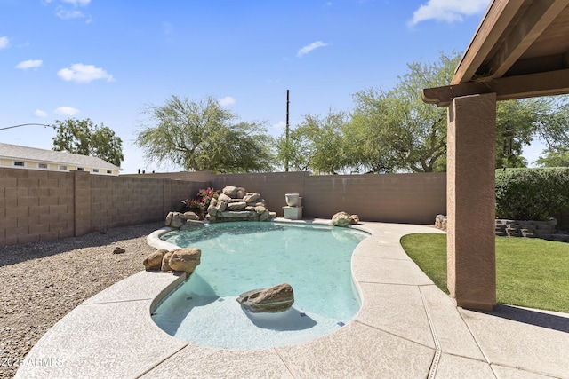 view of pool with a fenced backyard and a patio area