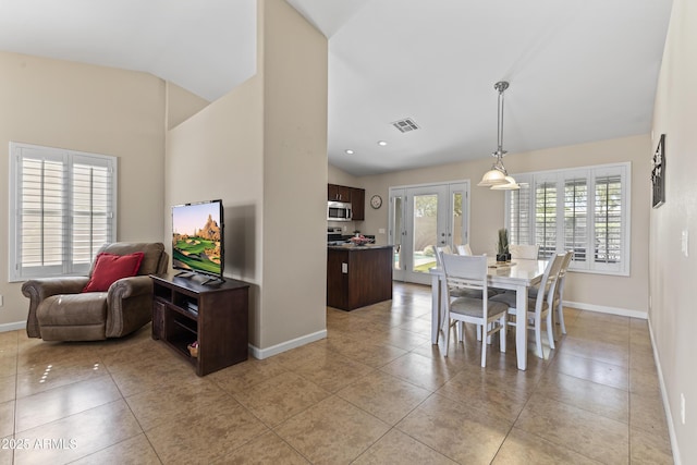 dining room with baseboards, french doors, light tile patterned floors, high vaulted ceiling, and recessed lighting