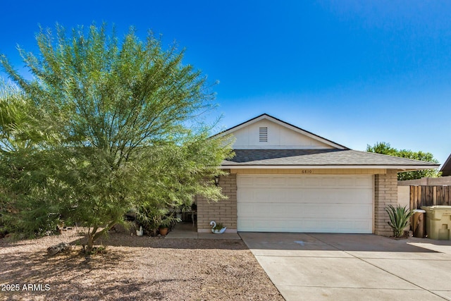 ranch-style home with a garage