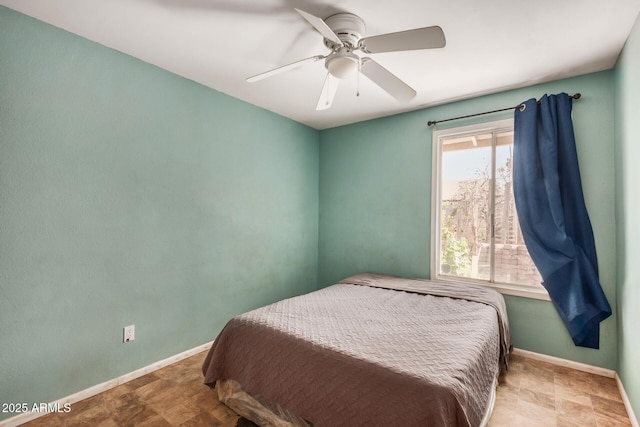 bedroom featuring ceiling fan