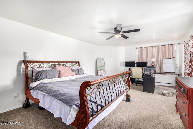 bedroom featuring light colored carpet and ceiling fan