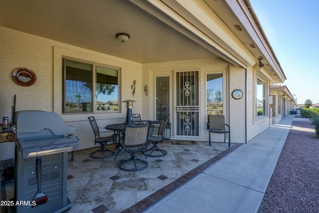 view of patio with outdoor dining space