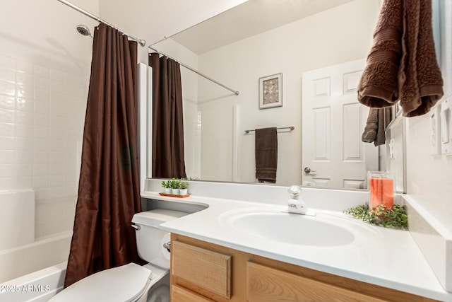 full bathroom with toilet, vanity, and shower / bath combo with shower curtain