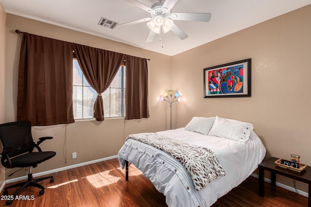 bedroom featuring ceiling fan and wood-type flooring