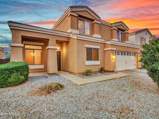 view of front of house with a garage