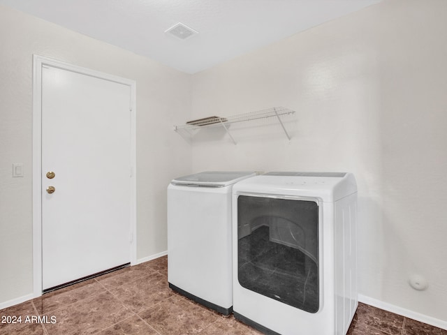 laundry area with washer and dryer