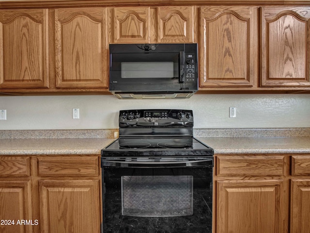 kitchen with black appliances