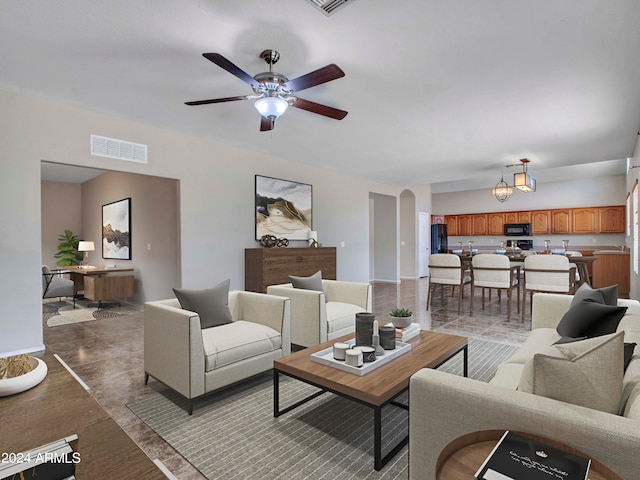 living room featuring ceiling fan