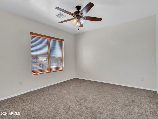 empty room with carpet and ceiling fan