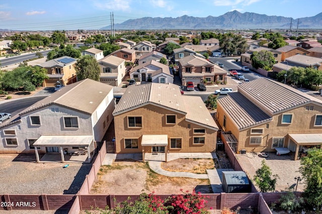 birds eye view of property featuring a mountain view