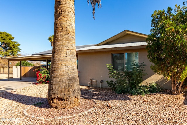 view of home's exterior with a patio