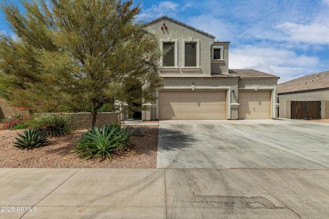 887 W Santa Gertrudis Trl, San Tan Valley, AZ 85143 - mediterranean / spanish-style house with stucco siding, driveway, a tile roof, an attached garage, and a garage