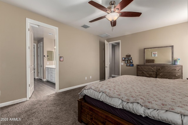887 W Santa Gertrudis Trl, San Tan Valley, AZ 85143 - carpeted bedroom with baseboards, ensuite bath, and a ceiling fan