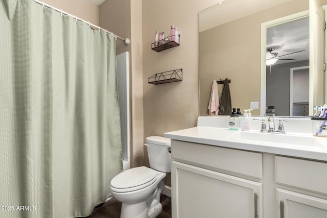 887 W Santa Gertrudis Trl, San Tan Valley, AZ 85143 - bathroom with vanity, toilet, ceiling fan, and shower / tub combo with curtain