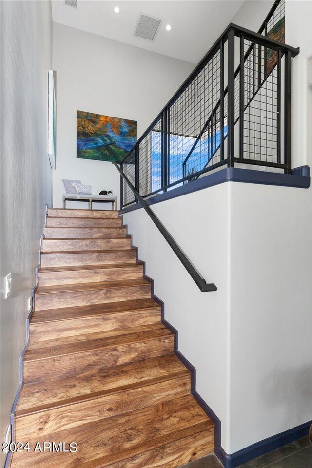 stairs with a high ceiling