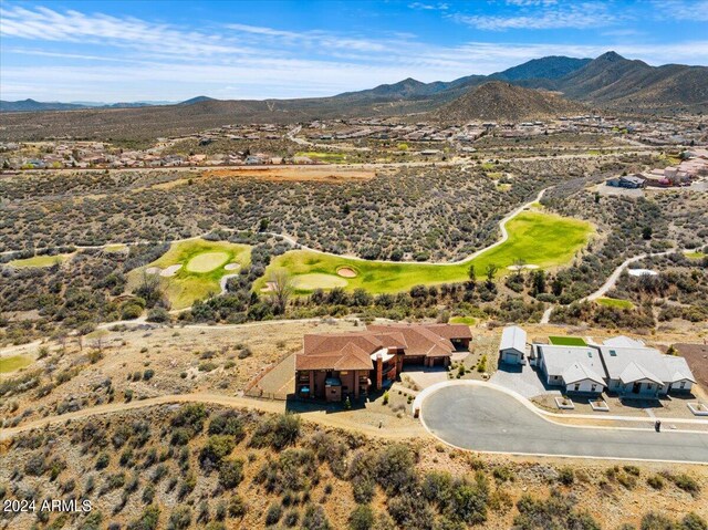 birds eye view of property featuring a mountain view