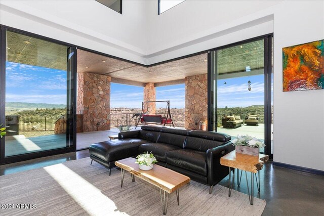 living room featuring concrete floors