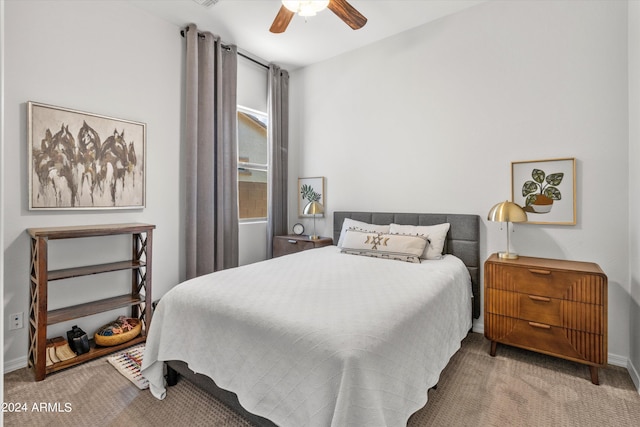 bedroom with ceiling fan and carpet flooring