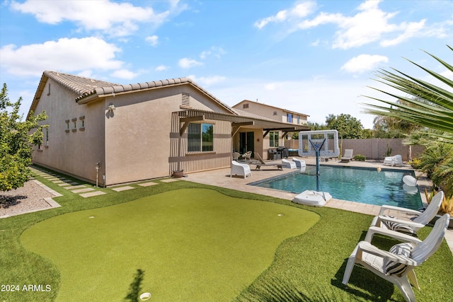 view of pool featuring a patio