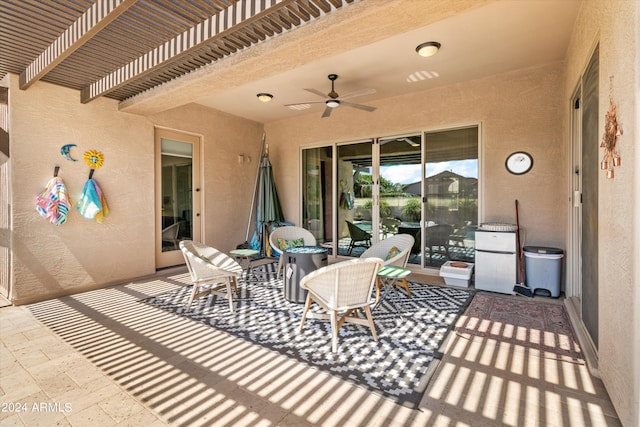 view of patio with a pergola and ceiling fan