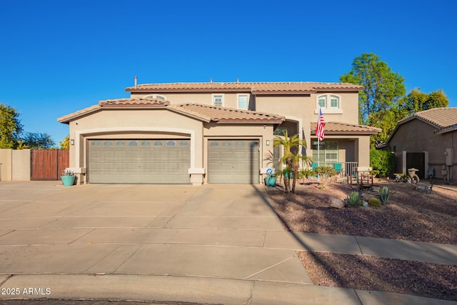 mediterranean / spanish home featuring a garage