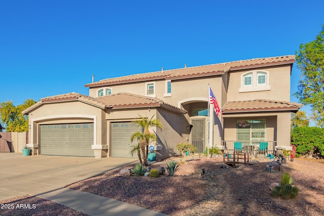 mediterranean / spanish-style home featuring a garage