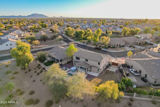 drone / aerial view featuring a mountain view