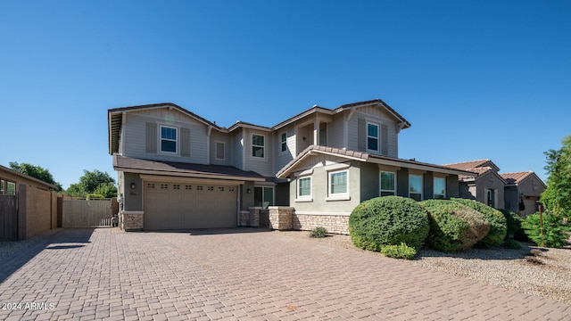 view of front of property with a garage