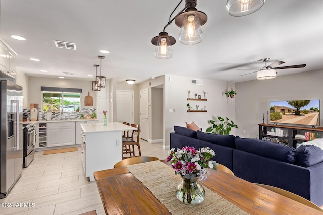 2520 E Flower St, Phoenix, AZ 85016 - dining room with beverage cooler and ceiling fan