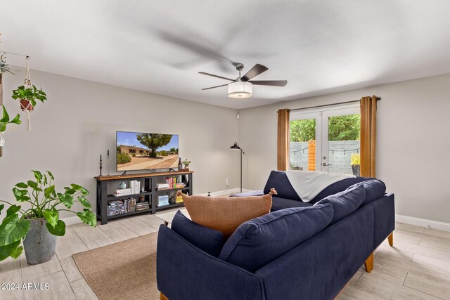 2520 E Flower St, Phoenix, AZ 85016 - living room featuring ceiling fan and french doors