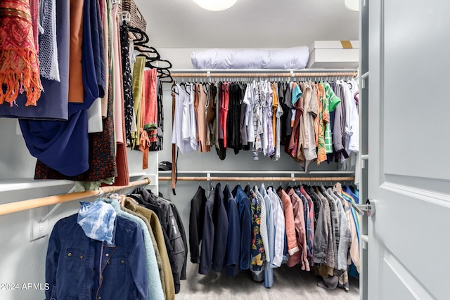 2520 E Flower St, Phoenix, AZ 85016 - walk in closet with wood-type flooring