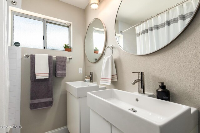 laundry room featuring stacked washer and clothes dryer