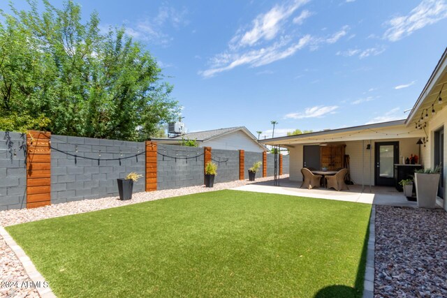 view of yard with a patio