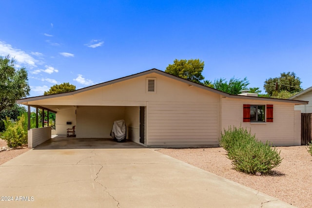 2520 E Flower St, Phoenix, AZ 85016 - view of side of property with a carport