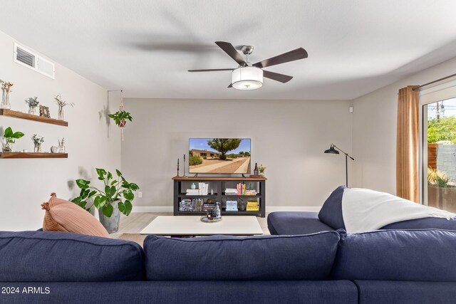 dining room featuring ceiling fan and beverage cooler