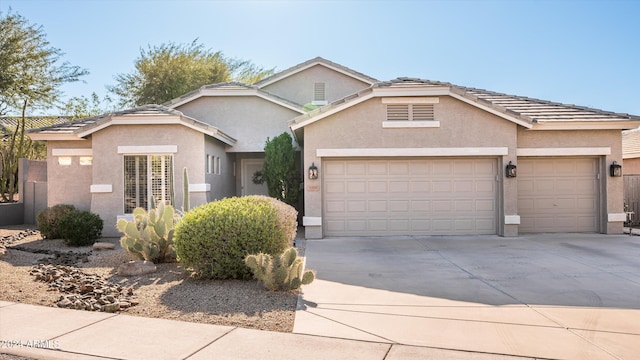 view of front of property featuring a garage