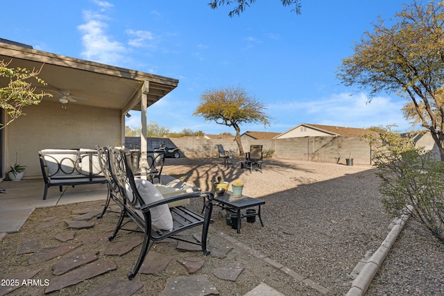 view of patio with ceiling fan