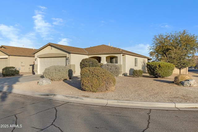 view of front of property with a garage