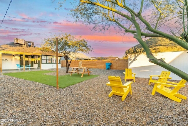 view of home's community with a patio area