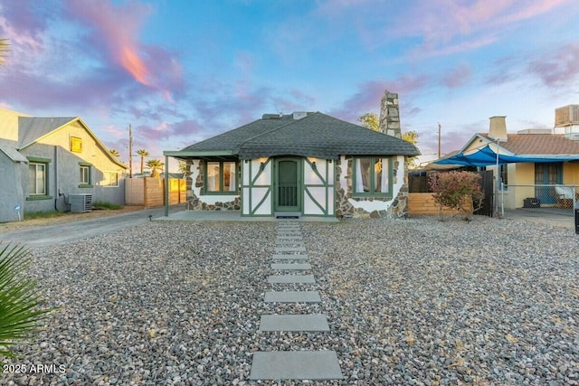 view of front of house featuring central AC unit