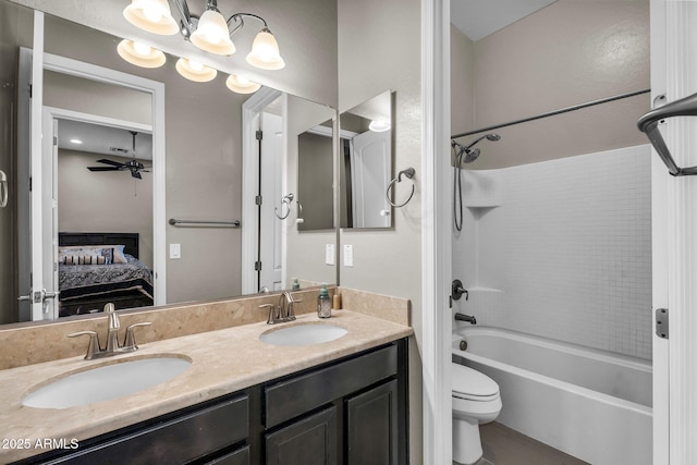 21004 E Sunset Dr, Queen Creek, AZ 85142 - bathroom with a sink, toilet, double vanity, and connected bathroom