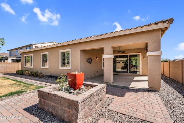 21004 E Sunset Dr, Queen Creek, AZ 85142 - rear view of property with a fenced backyard, stucco siding, a ceiling fan, and a patio area