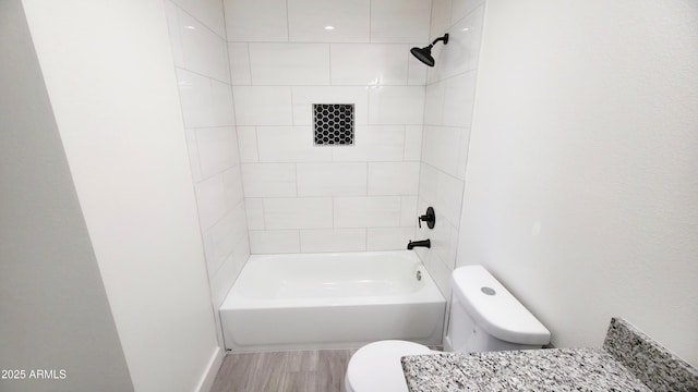 4219 W Citrus Way, Phoenix, AZ 85019 - full bathroom with toilet, wood finished floors, and shower / tub combination