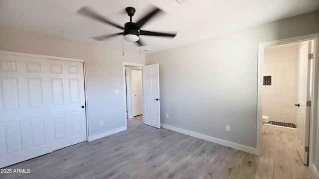 4219 W Citrus Way, Phoenix, AZ 85019 - unfurnished bedroom with light wood-style flooring, a closet, baseboards, and ensuite bath