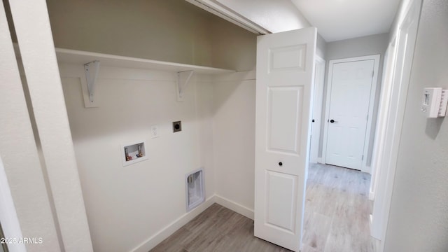 4219 W Citrus Way, Phoenix, AZ 85019 - washroom featuring hookup for an electric dryer, light wood-style floors, hookup for a washing machine, and baseboards