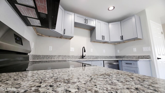 4219 W Citrus Way, Phoenix, AZ 85019 - kitchen with recessed lighting, light stone countertops, stainless steel dishwasher, and a sink