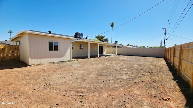 4219 W Citrus Way, Phoenix, AZ 85019 - back of house with central AC unit, a fenced backyard, and a patio